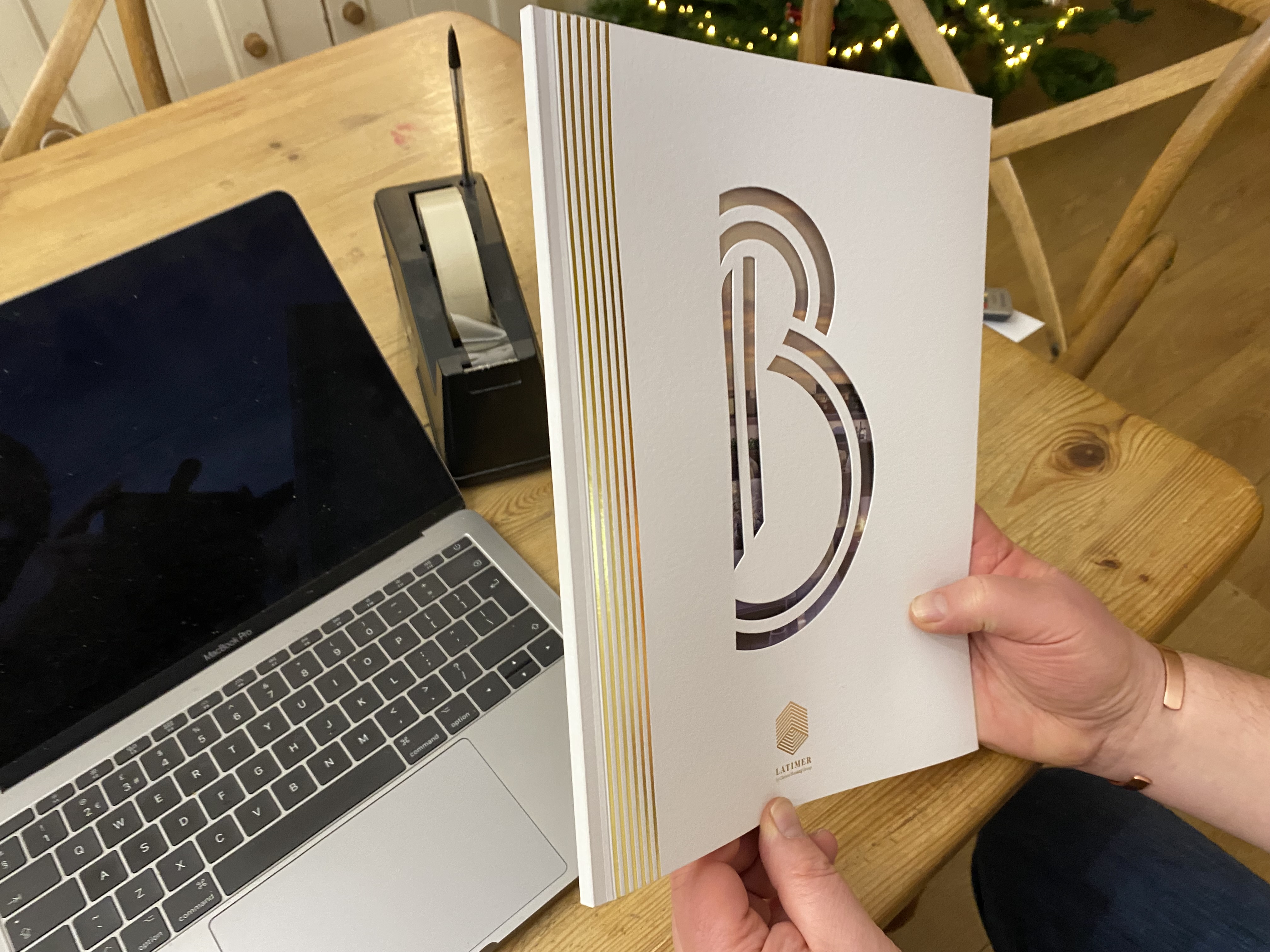Die cut, debossed and gold foil print finished booklet